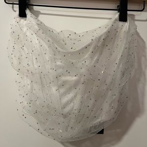 “Draped in rhinestones corset top” from Fashion nova